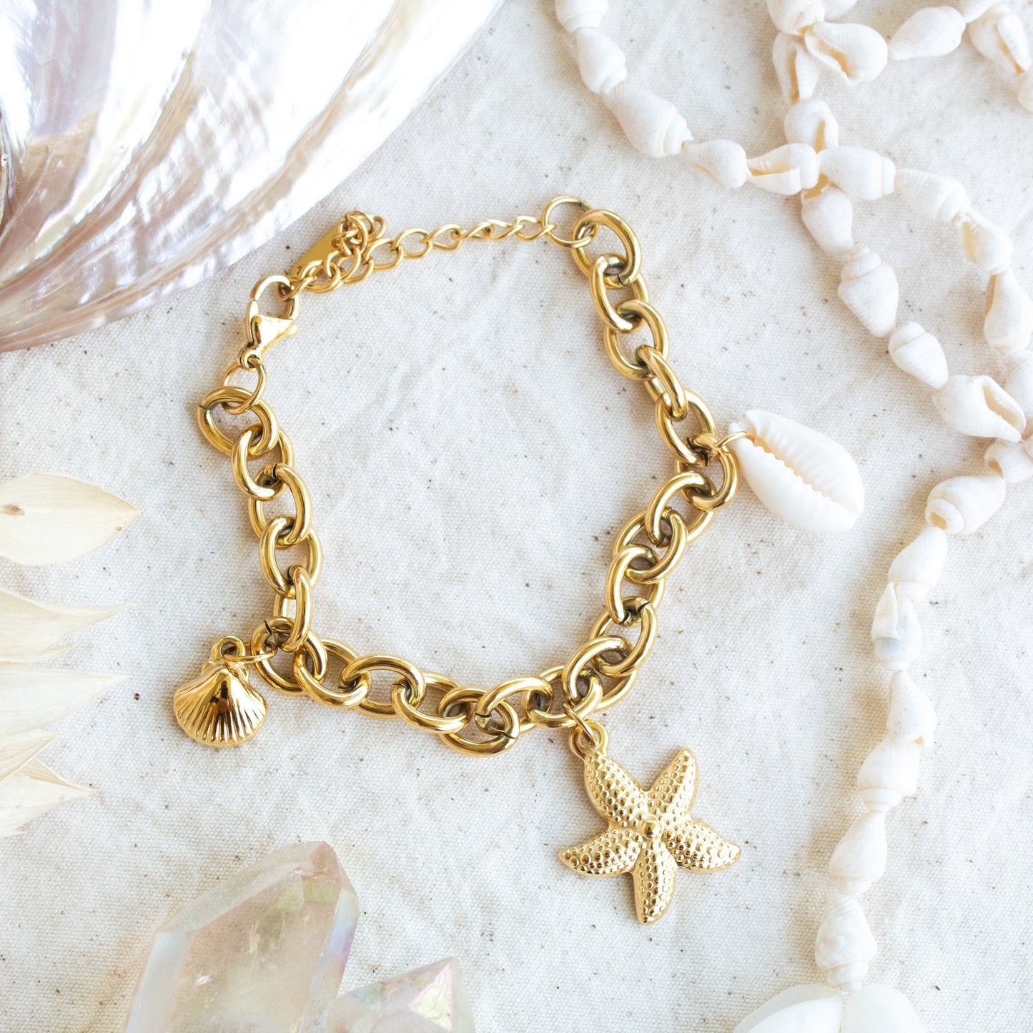 Gold Ocean Spell bracelet with shell and starfish charms