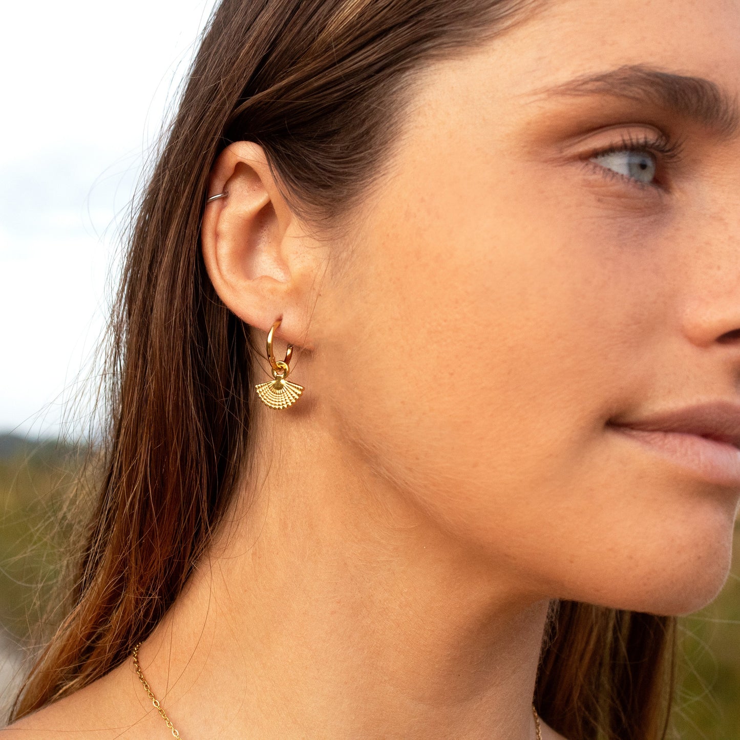 Gold fan-shaped bohemian drop earrings