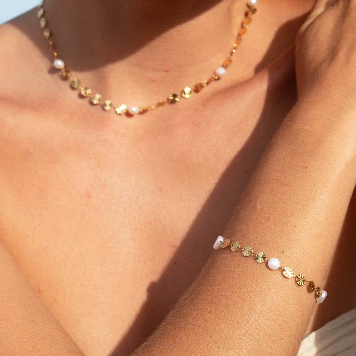 Gold pearl necklace and bracelet set