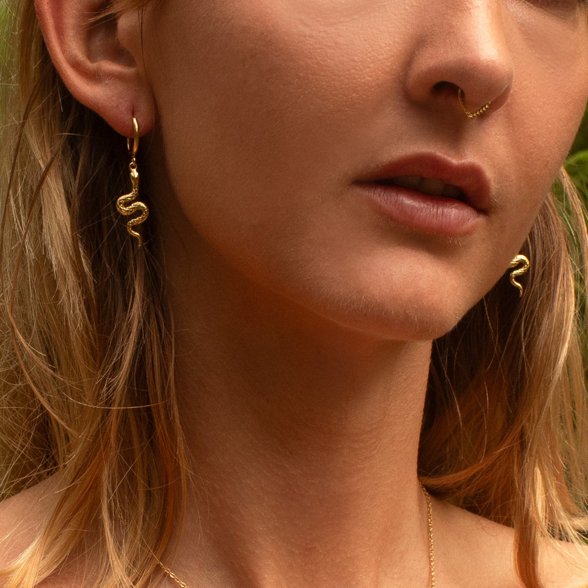 Gold serpent hoop earrings