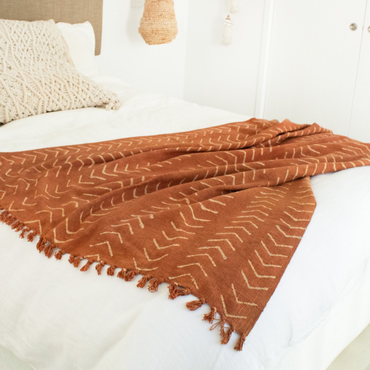 Looma Tribal Throw Blanket in burnt orange with tassels