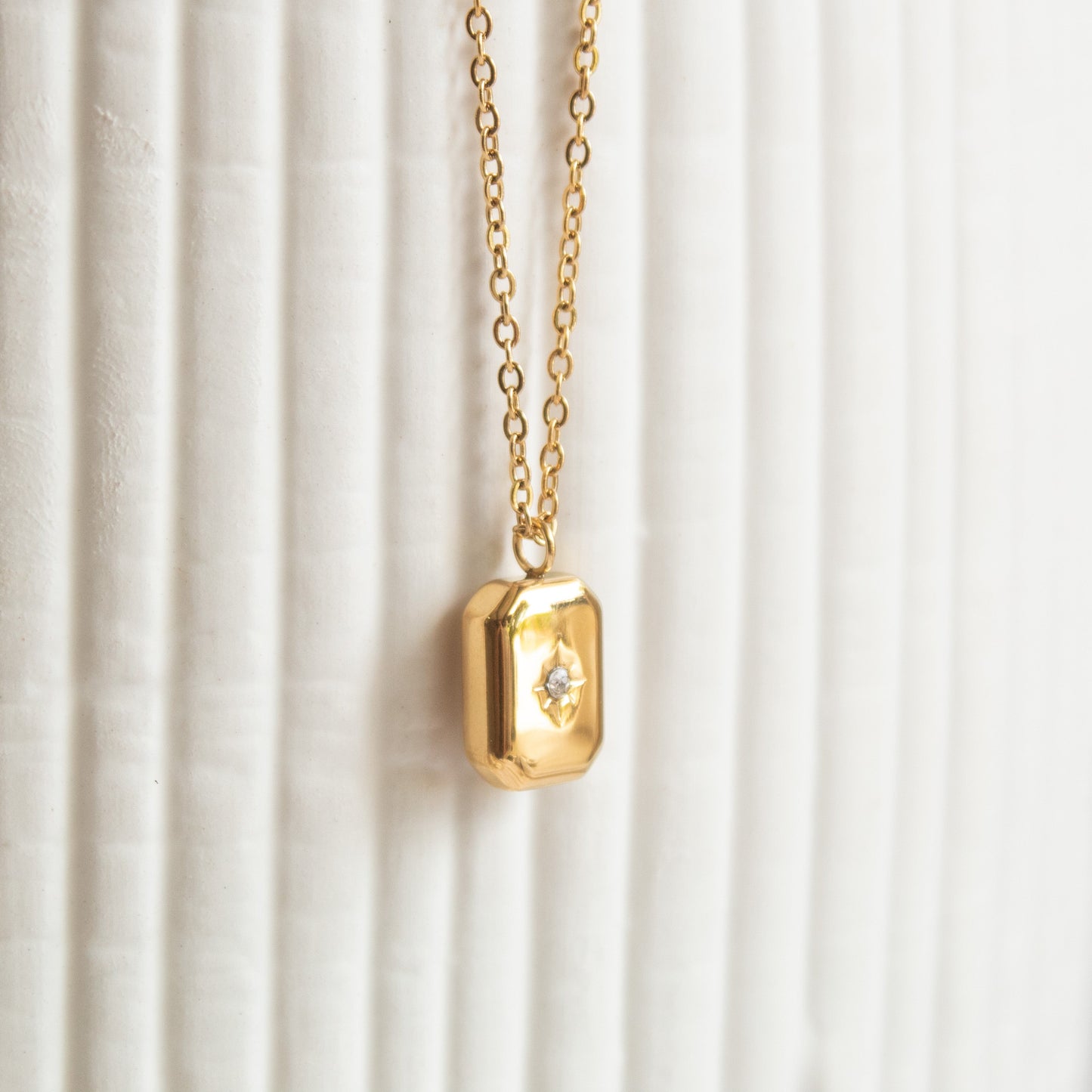Gold star rectangle necklace with diamond accent