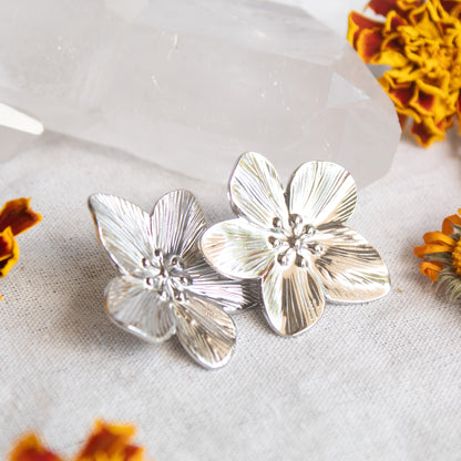 Silver flower stud earrings