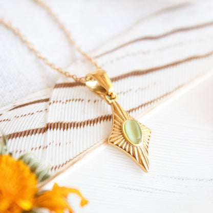 Gold Protection Necklace with green gemstone