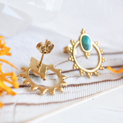 Gold sunburst earrings with turquoise