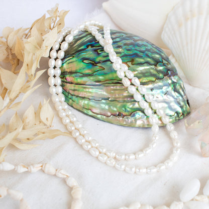 Serenity Tide Necklace with pearls on abalone shell