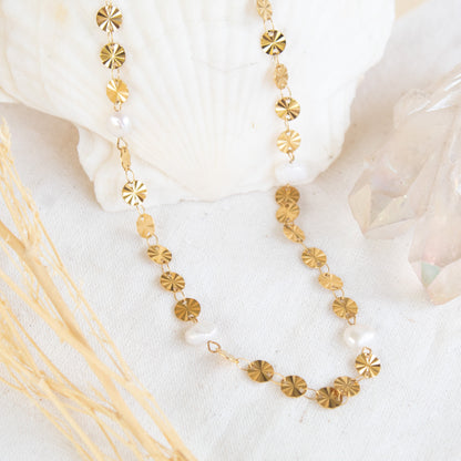 Gold disc and pearl necklace