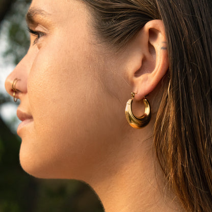 Gold crescent hoop earrings