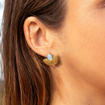 Sacred Dream fan-shaped earrings with blue stone
