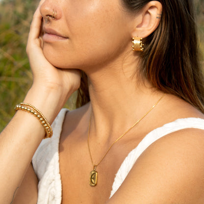 Gold textured hoop earrings