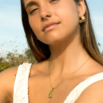 Gold celestial pendant necklace