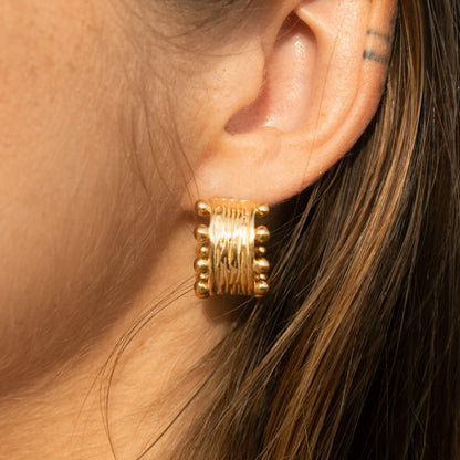Gold textured hoop earrings