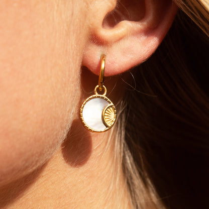 Gold mother of pearl sun earrings