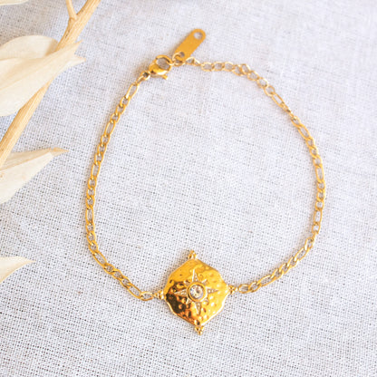 Gold bracelet with diamond star charm