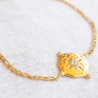 Gold bracelet with diamond star charm
