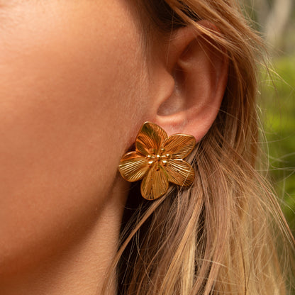 Gold flower stud earrings