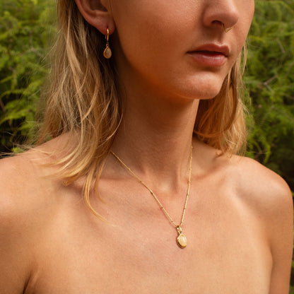Gold necklace with pink opal droplet pendant