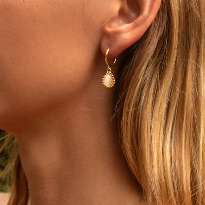 Gold hoop earrings with pink opal droplet
