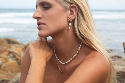 Gold starfish pearl earrings
