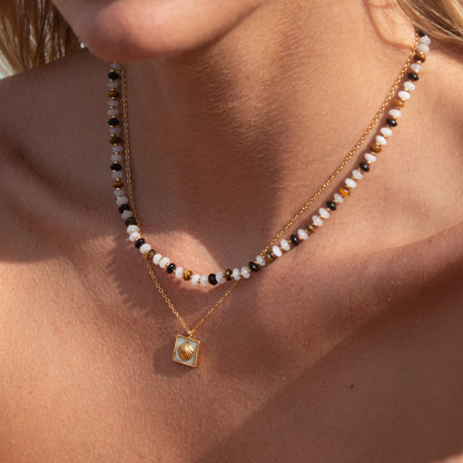 Golden Ember Necklace with shell pendant