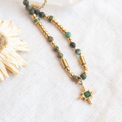 Emerald star necklace with gold beads
