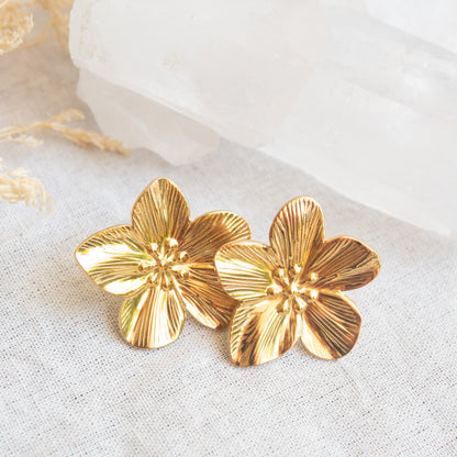 Gold flower stud earrings