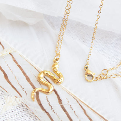 Gold snake pendant necklace