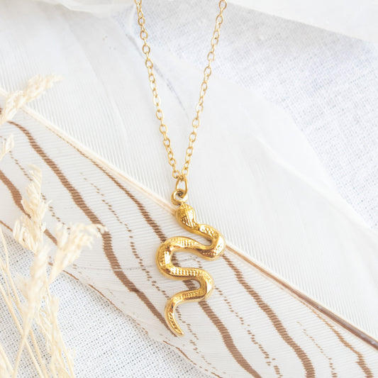 Gold snake pendant necklace