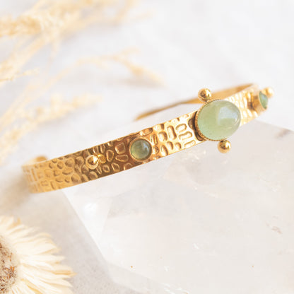 Gold hammered bangle with green jade stones