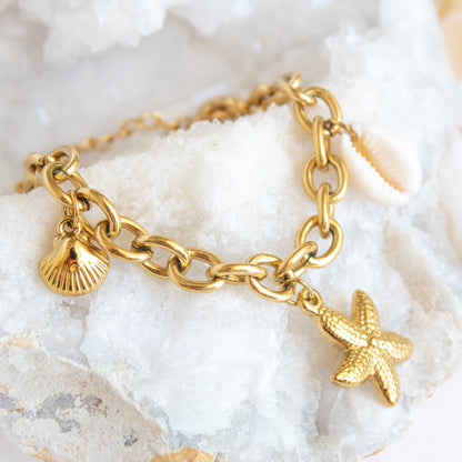 Gold Ocean Spell bracelet with charms