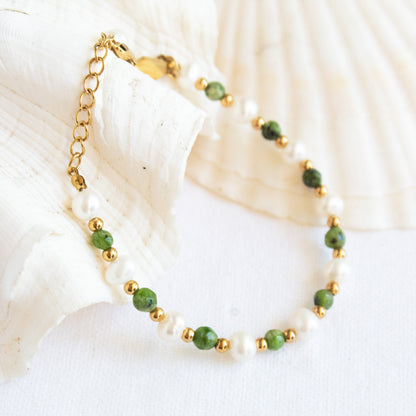 Gold chain bracelet with pearls and green beads