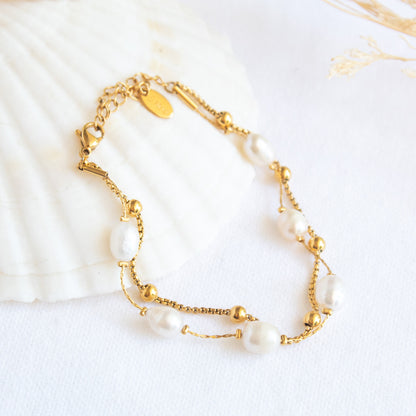 Gold bracelet with pearls and beads