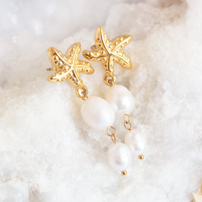 Gold starfish pearl drop earrings
