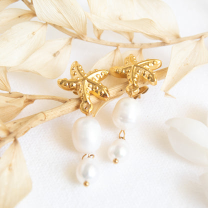 Gold starfish pearl drop earrings