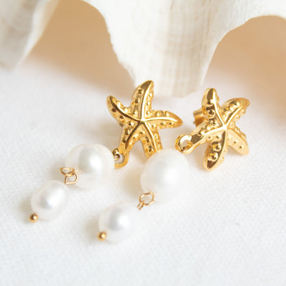 Gold starfish pearl drop earrings