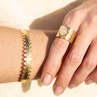 Gold-tone bracelet and rose quartz ring