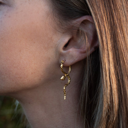 Ananta Serpent Earrings: gold snake hoop earrings