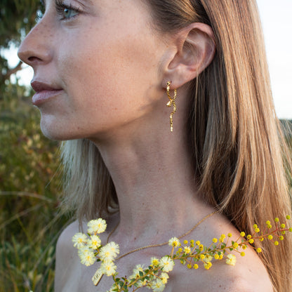 Ananta Serpent gold earrings with diamonds