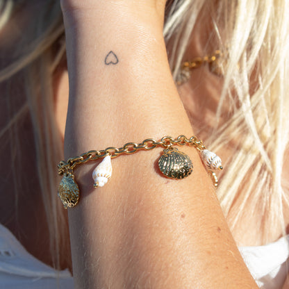 Gold bracelet with shell charms