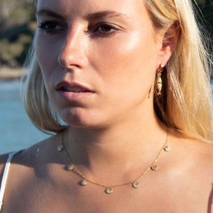 Gold shell necklace and earrings