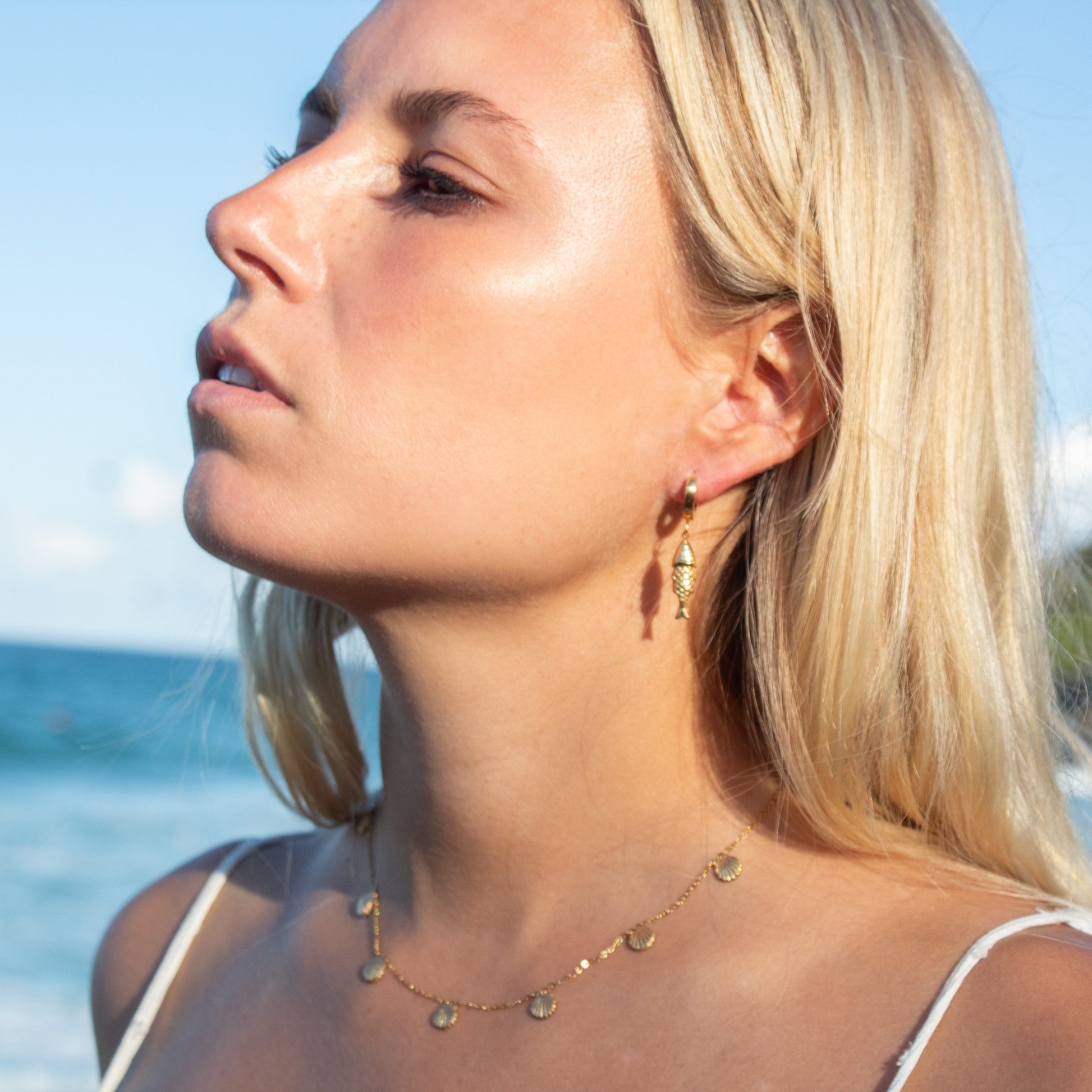 Gold fish charm necklace