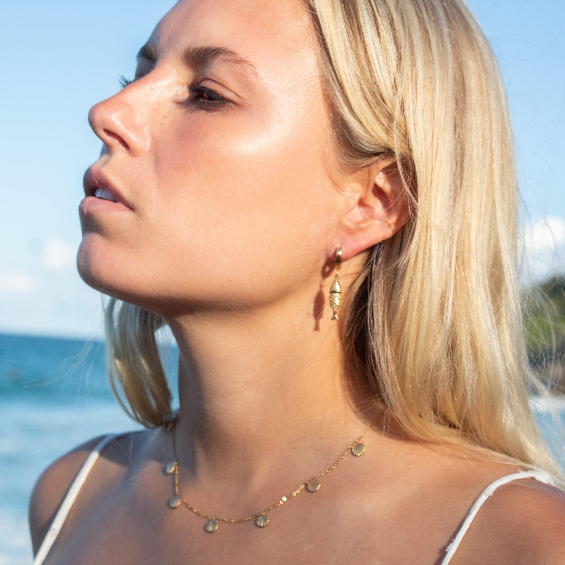 Gold reef fish earrings