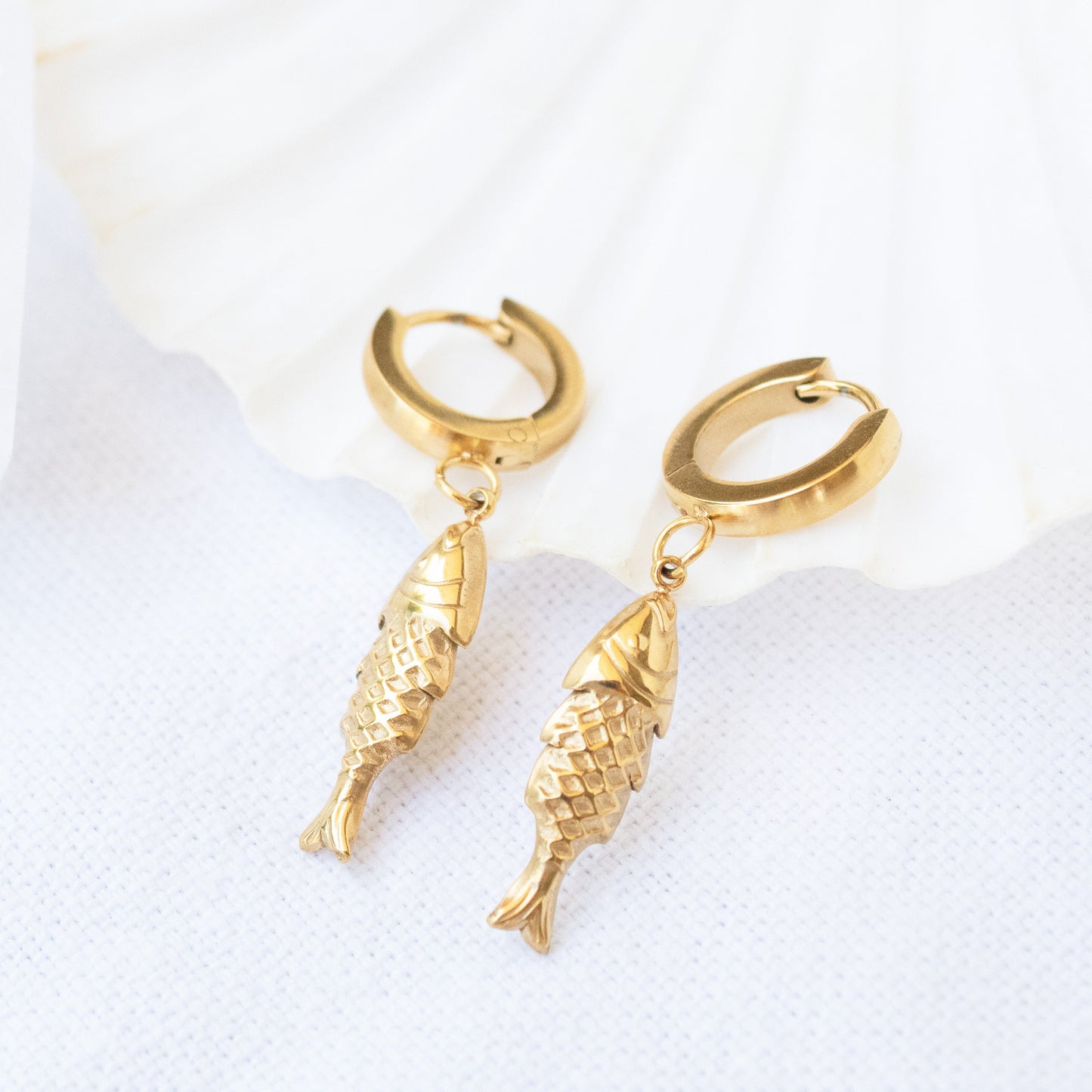 Gold fish hoop earrings