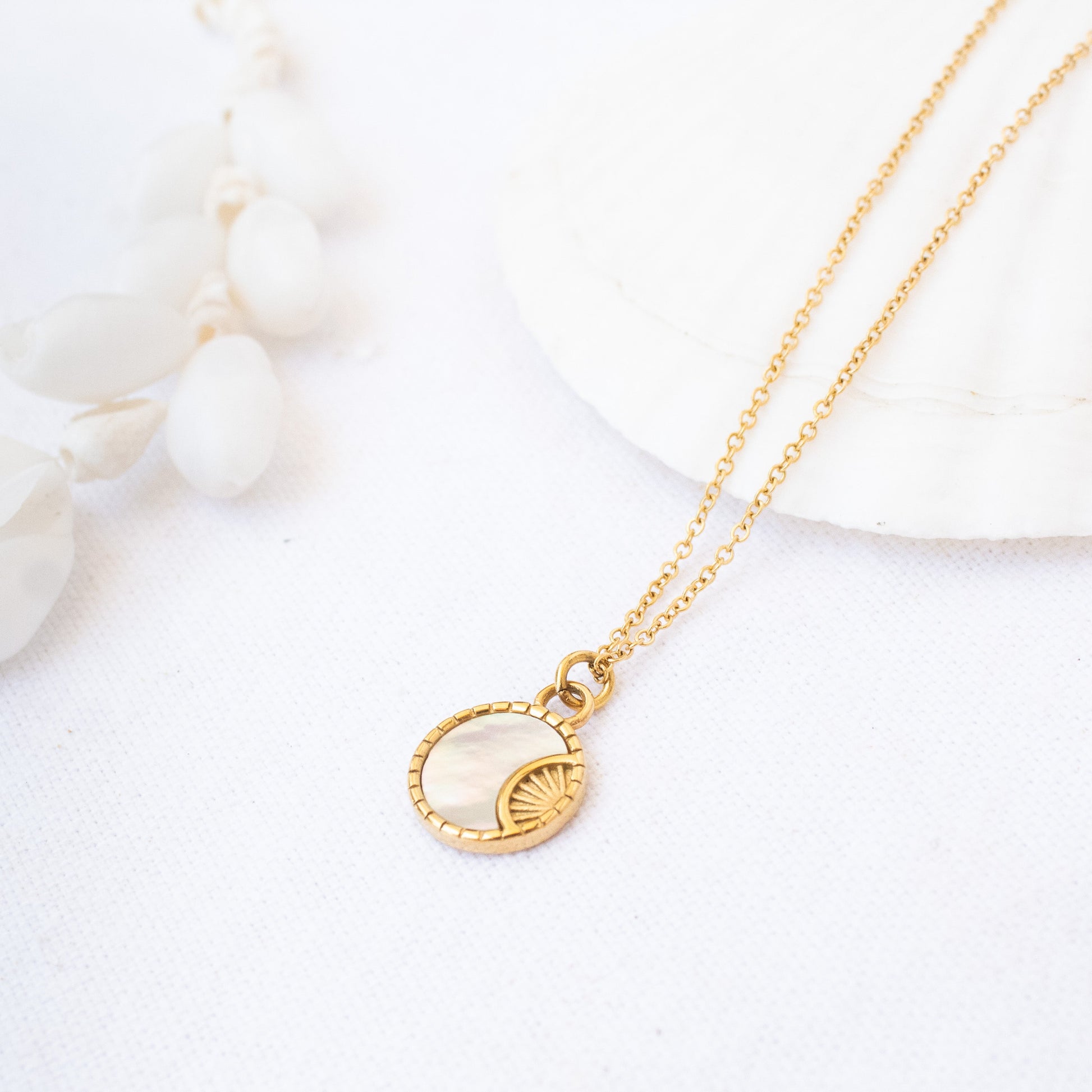 Gold mother of pearl sunburst necklace