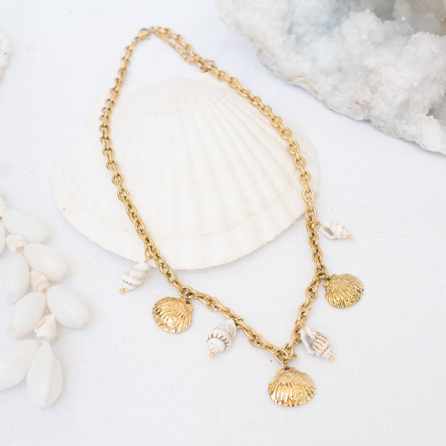 Gold necklace with seashell charms