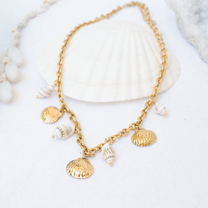 Gold necklace with seashell charms