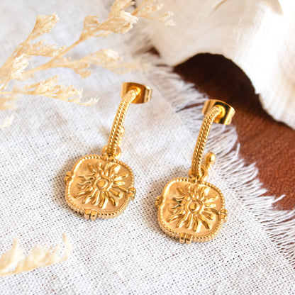 Gold sun pendant drop earrings