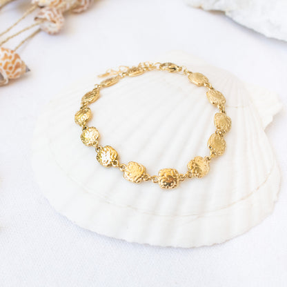 Gold Essence bracelet with hammered coin-shaped charms