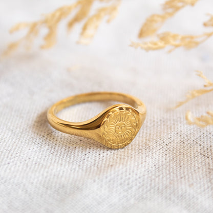 Gold sun signet ring