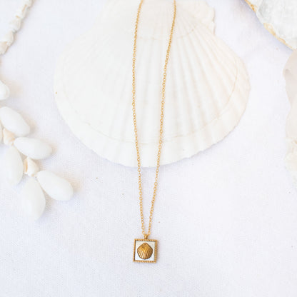 Gold Siren necklace with shell pendant